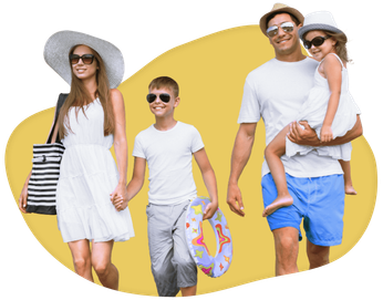 Smiling family in the sun, dressed for the beach
